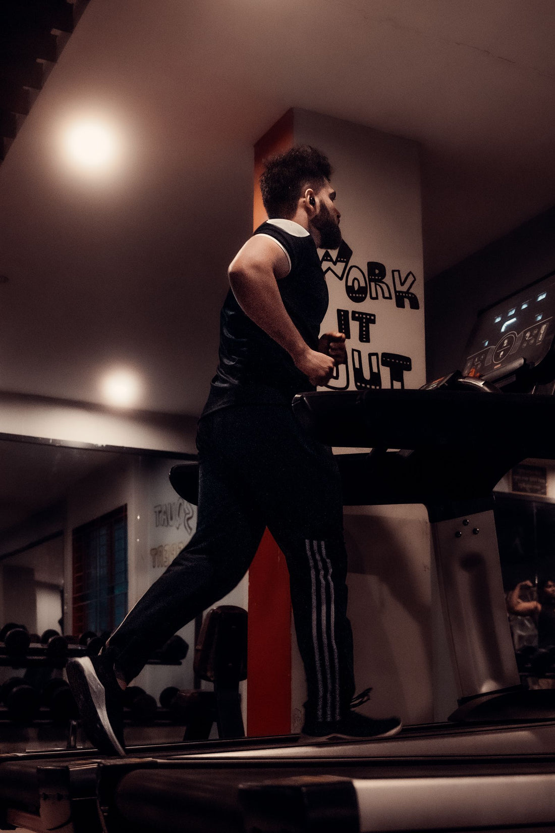 Runner training on a smart treadmill with a connected console, illustrating smart treadmills available in South Africa