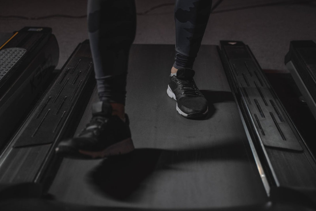 Close-up of a treadmill deck and belt, the parts most often excluded from a treadmill warranty