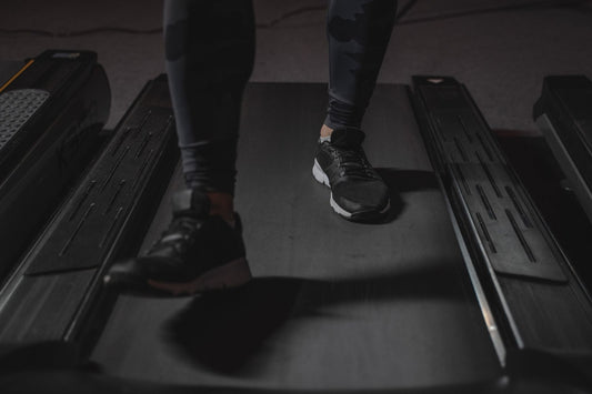 Close-up of a treadmill deck and belt, the parts most often excluded from a treadmill warranty